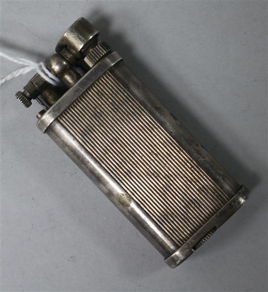A Dunhill Unique lighter, 65mm.